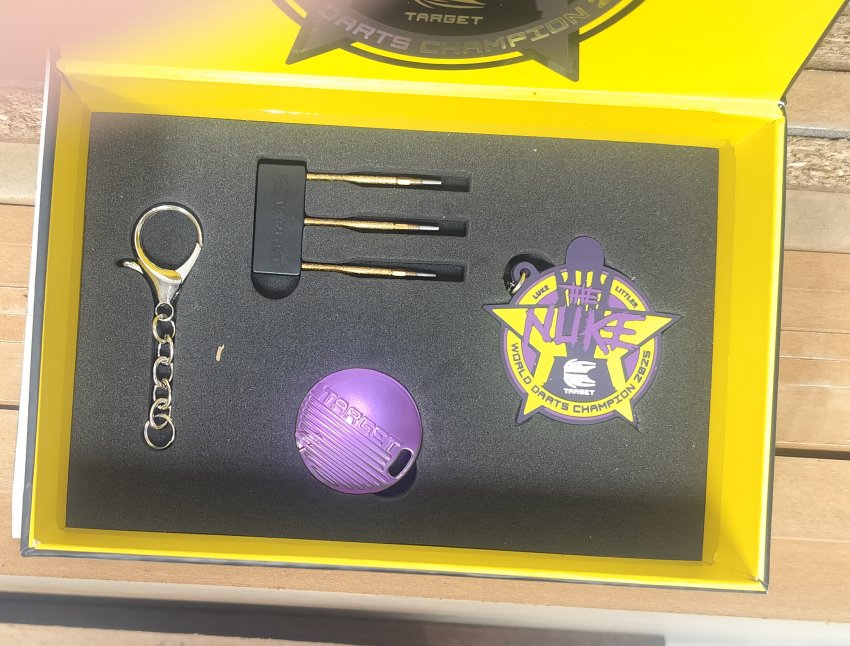 Luke Littler darts + box contents